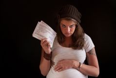 pregnant girl with contract.jpg