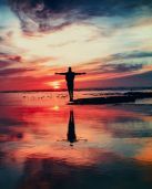 Man at beach sunset unsplash_m.jpg
